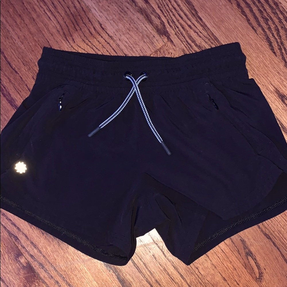 black ATHLETA GIRLS running shorts